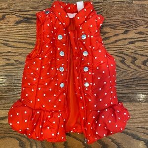 Red polka-dot puffer vest